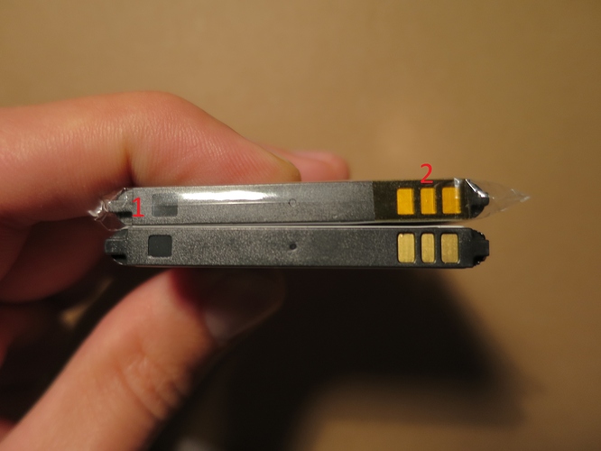 Top sides of the F1B101 (above) and HB5N1 batteries by vhbw